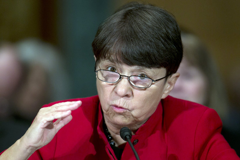 SEC Chairwoman Mary Jo White, seen at a Senate Banking Committee hearing in March, is the first former prosecutor to run the agency that regulates Wall Street.