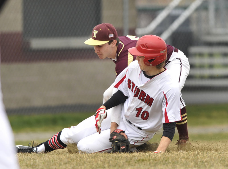Sam Terry of Scarborough is tagged out by Thornton third baseman Drew Lavigne while attempting to steal in the fourth inning of their opener.