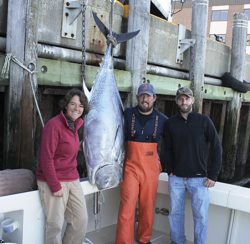 Captains Linda Greenlaw and Rob Evon and first mate Brandon Pierce with a 74-inch bluefin that sold at auction in Tokyo last year for $4,000.
