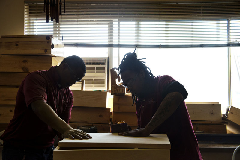 Students Terrence Sinclair, 18, and Kent Tucker, 17, study woodworking in the District of Columbia’s Living Classrooms Program. The new GED exam that they will take should be a better measure of their capabilities.