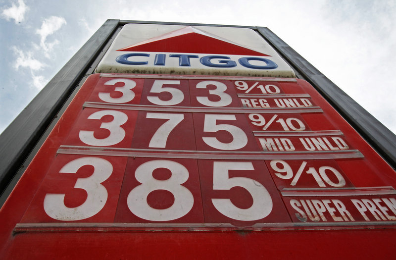 Gasoline prices are shown in Montpelier, Vt., on Friday. Prices have fallen by 28 cents per gallon since Feb. 27.
