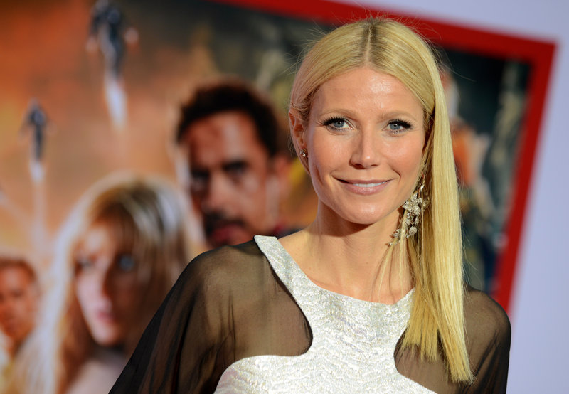 Gwyneth Paltrow arrives for the premiere of “Marvel’s Iron Man 3” on Wednesday after being honored by People magazine.