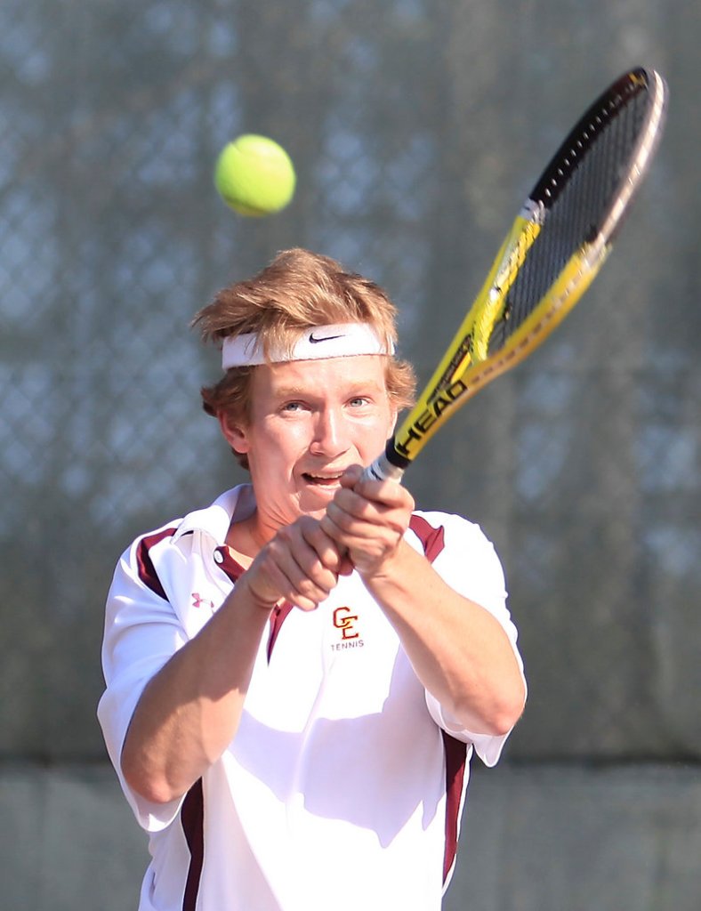 Sam Sherman of Cape Elizabeth returns a shot Friday during his doubles match with Satchel McCarthy against Tom Wilberg and Ben Aicher of Falmouth. Sherman and McCarthy won in straight sets, and the Capers took the match, 4-1.
