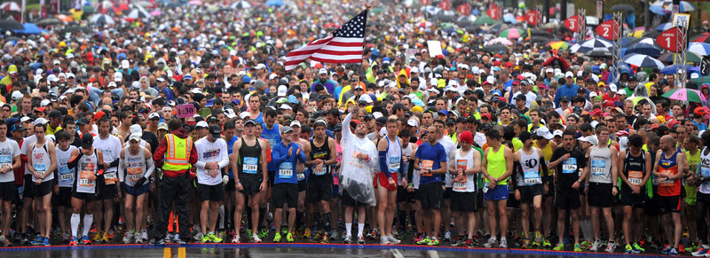 Runners in the St. Jude Country Music Marathon in Nashville, Tenn., observe a moment of silence for those injured and killed in the Boston Marathon bombings.
