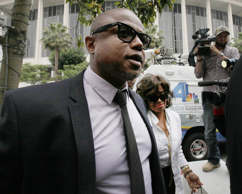 Randy Jackson and Rebbie Jackson, background right, brother and sister of Michael Jackson, arrive for Katherine Jackson’s lawsuit against concert giant AEG Live on Monday.