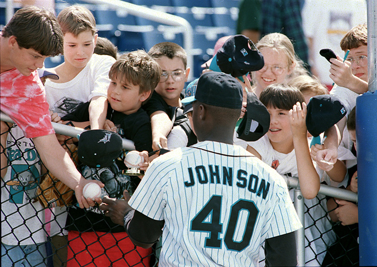 Young Sea Dog fans swarm to Charles Johnson for his autograph on 7/14/94 at Hadlock Field. photo by John Patriquin Baseball