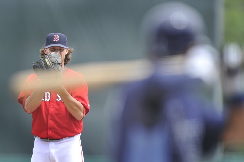 File photo/Press Herald Red Sox starting pitcher Clay Buchholz prepares to pitch to a Ray's hitter in a final home exhibition game in 2011. Baseball