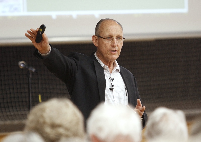 Peter Vigue, chairman and chief executive officer of Cianbro Corp., addresses a public meeting in May 2012 on the proposed east-west highway.