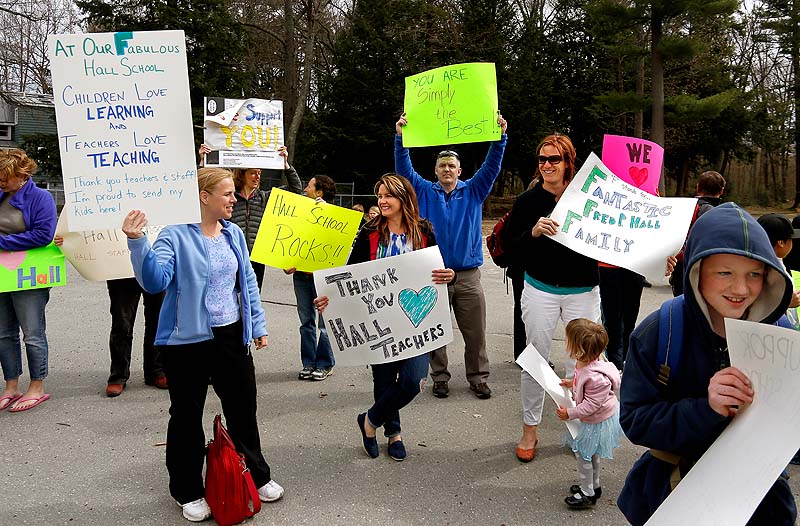 Parents gather at the Fred P. Hall Elementary School on Thursday to show their support for teachers after the LePage administration gave the school an "F" in its new state rankings.