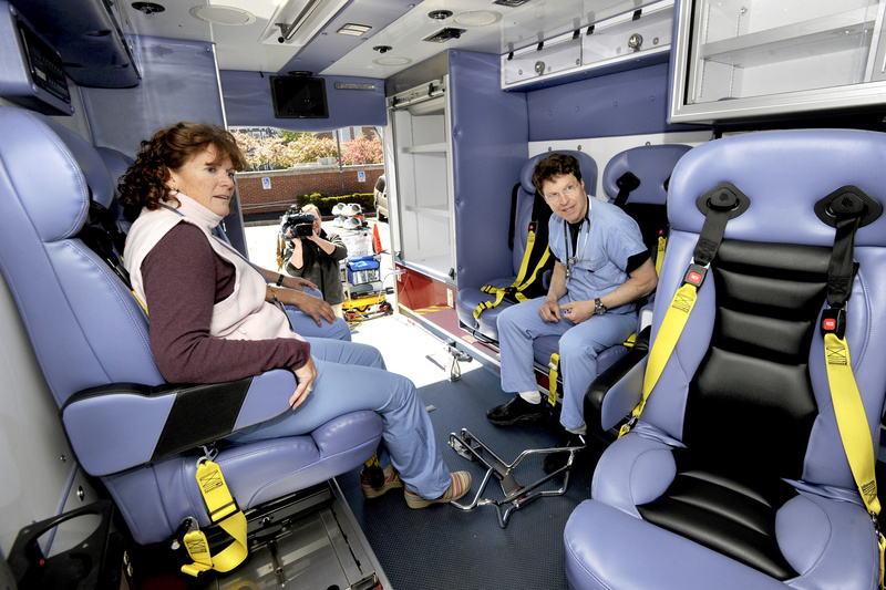 Registered Nurse Laura Barra and respiratory therapist John Fischer inspect the interior of a new pediatric ambulance at Maine Medical Center on Tuesday.