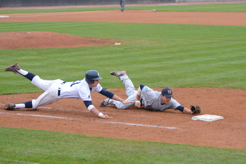 USM's John Carey slides to first to make the play, but the runner was called safe. Baseball Portland Press Herald University of Southern Maine5