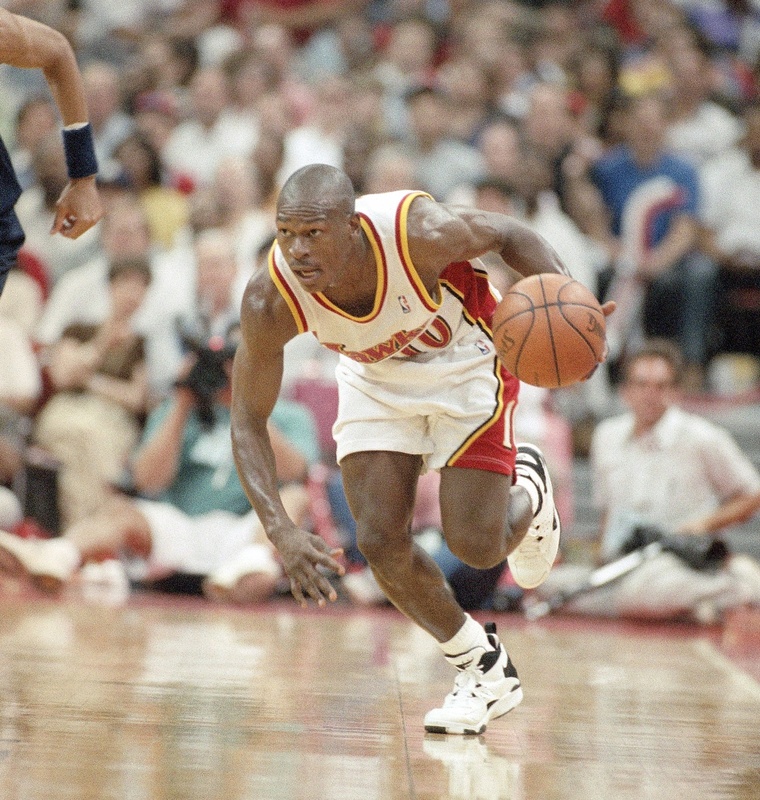 Atlanta Hawks guard Mookie Blaylock brings the ball up court during the Hawks' 92-69 victory over the Indiana Pacers in game two of the Eastern conference semi-final in May 1994 in Atlanta. Action,Competition,Effort,Professional,Skill,Spectators,Sportsperson