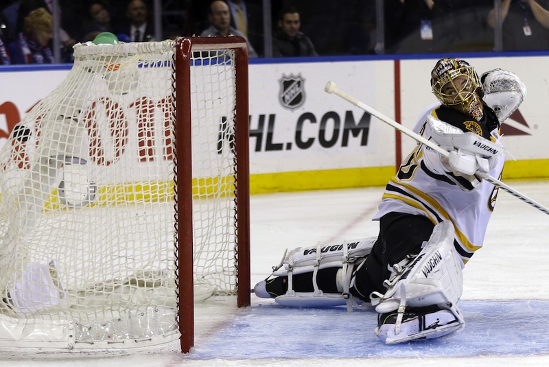 Boston Bruins goalie Tuukka Rask watches as the winning goal by New York Rangers' Chris Kreider gets past him during the overtime period in Game 4 of the Eastern Conference semifinals in the NHL hockey Stanley Cup playoffs in New York, Thursday, May 23, 2013, in New York.The Rangers defeated the Bruins 4-3. (AP Photo/Seth Wenig)