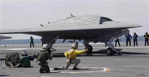 A Navy X-47B drone is launched off the nuclear powered aircraft carrier USS George H. W. Bush off the coast of Virginia on Tuesday.