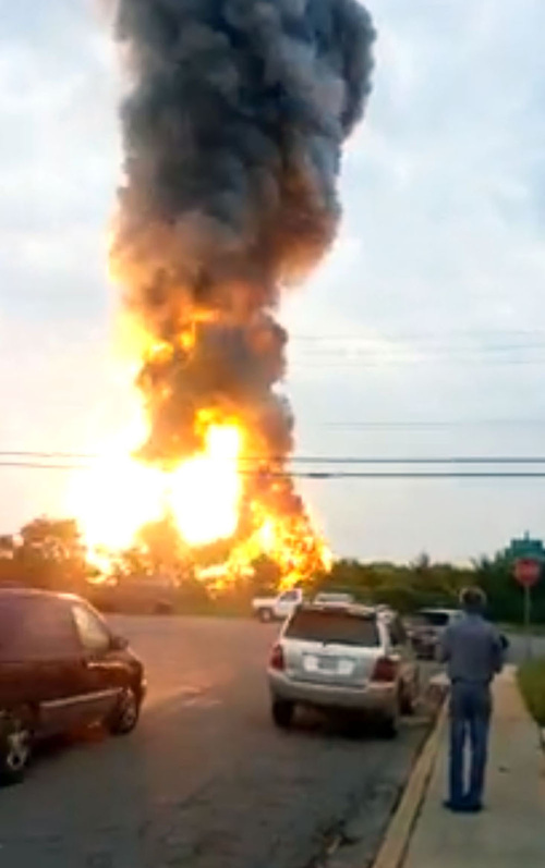 This still taken from video provided by James LeBrun shows an explosion outside Baltimore on Tuesday.