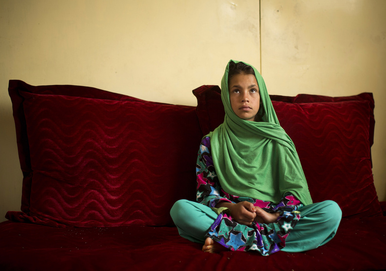 Zardana, 11, speaks in Kandahar, Afghanistan, last month about a pre-dawn attack last year when a U.S. soldier burst into her family's home. Zardana said her visiting cousin saw the soldier chasing them and ran to help, but he was shot and killed. "We couldn't stop. We just wanted somewhere to hide. I was holding on to my grandmother and we ran to our neighbors."