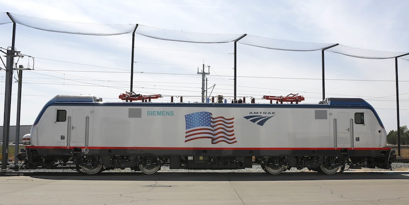 In this photo taken Saturday, May 11, 2013, is one of the new Amtrak Cities Sprinter Locomotives built by Siemens Rails Systems in Sacramento, Calif. The new electric locomotive will run on the Northeast intercity rail lines and replace Amtrak locomotives that have been in service for 20 to 30 years. (AP Photo/Rich Pedroncelli)