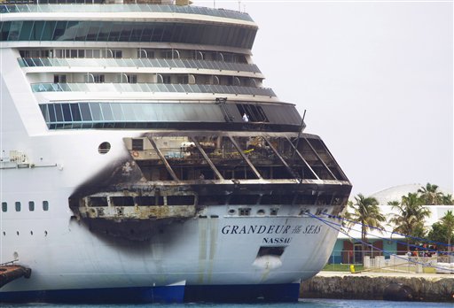 The fire-damaged exterior of Royal Caribbean's Grandeur of the Seas cruise ship is seen while docked in Freeport, Grand Bahama island on Monday. All 2,224 guests and 796 crew were safe and accounted for.