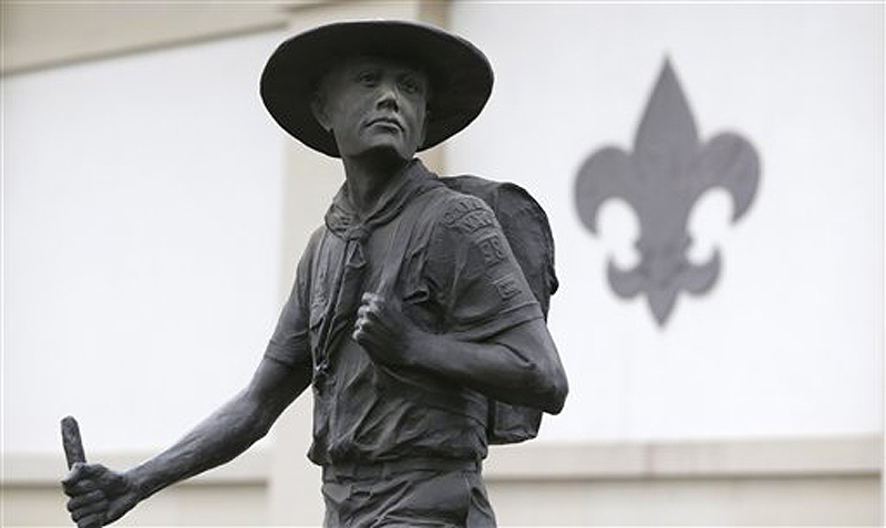 A statue of a Boy Scout stands in front of the National Scouting Museum in Irving, Texas. Parents and leaders of Boy Scouts in Maine had differing views Thursday on Boy Scouts of America's decision to end a longtime ban on gay youths.