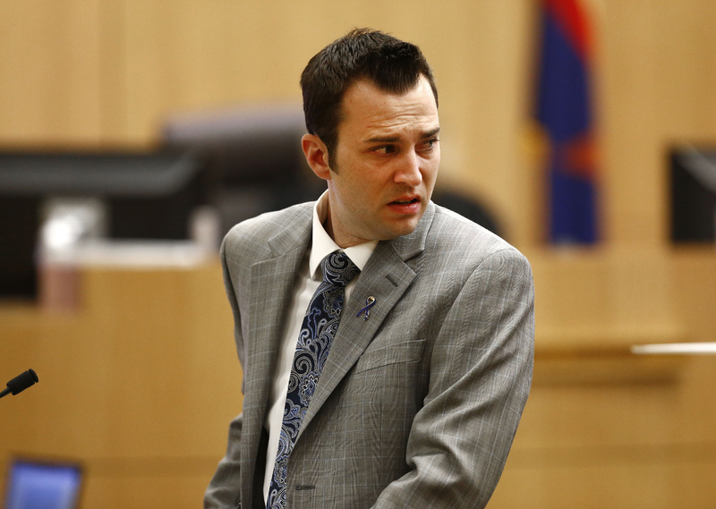 Steven Alexander, brother of murder victim Travis Alexander, looks back towards Jodi Arias as he reads a statement to the jury Thursday during the penalty phase of the Jodi Arias trial at Maricopa County Superior Court in Phoenix.