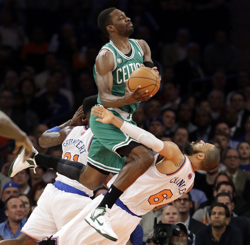 Boston Celtics forward Jeff Green (8) collides with New York Knicks center Tyson Chandler (6) in the first half of Game 5 of their first-round NBA basketball playoff series at Madison Square Garden in New York on Wednesday.
