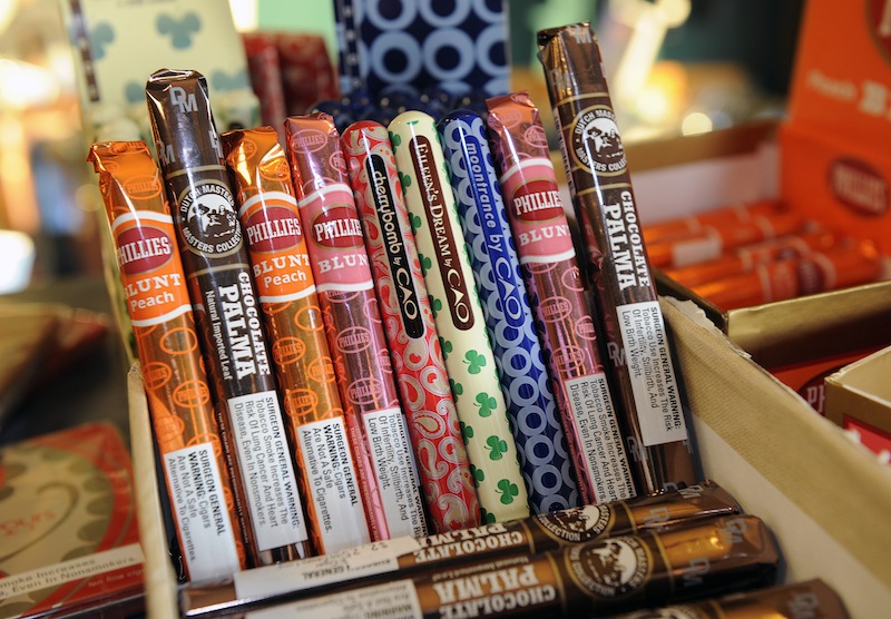 Candy-flavored cigars appear on display at a custom tobacco shop in Albany, N.Y., Friday, May 31, 2013. The American Cancer Society is pushing to make New York the first state to enact a comprehensive restriction on the sale of candy-and fruit-flavored cigarillos, chewing tobacco and tobacco used in water pipes. (AP Photo/Hans Pennink)