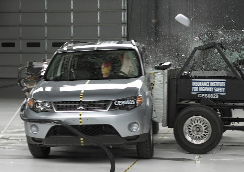 This undated handout photo provided by the Insurance Institute for Highway Safety (IIHS) shows a side crash of a 2008 Mitsubishi Outlander. A report released Thursday, May 16, 2013, shows only two of 13 small SUVs are getting passing grades in front-end crash tests done by an insurance industry group. (Photo/IIHS)