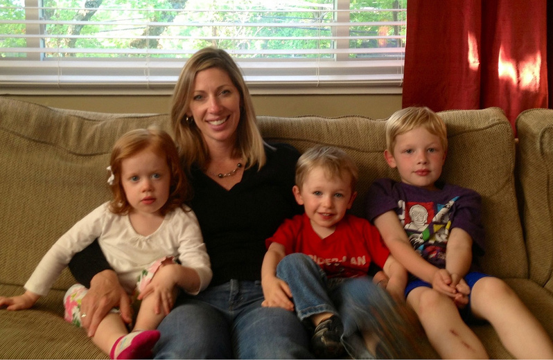 Sandy Lutton of McLean, Va., sits with her three children, twins Lilly and Luke and their older brother Jack, right. Lilly and Luke were born after Lutton spent 18 weeks of her pregnancy on strict bed rest. Research is raising new concern about the value of bed rest in preventing premature birth.
