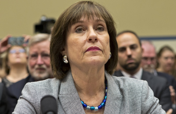 In this May 22, 2013, photo, Lois Lerner listens on Capitol Hill in Washington. A day after she refused to answer questions at a congressional hearing, Lerner has been replaced as director the Internal Revenue Service division that oversaw agents who targeted tea party groups. Danny Werfel, the agency's new acting commissioner, told IRS employees in an email Thursday, May 23, 2013, that he has selected a new acting head of the division, staying within the IRS to find new leadership. (AP Photo/J. Scott Applewhite)