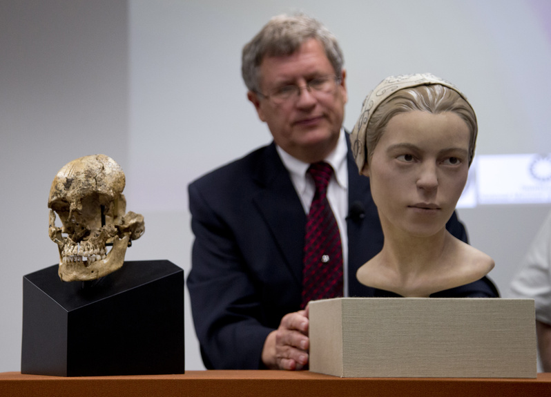 Doug Owsley, who leads the division for Physical Anthropology at the Smithsonian's National Museum of Natural History, displays the skull and facial reconstruction of "Jane of Jamestown" during a news conference at the museum in Washington on Wednesday. Scientists announced they have found the first solid archaeological evidence that some of the earliest American colonists at Jamestown, Va., survived harsh conditions by turning to cannibalism.