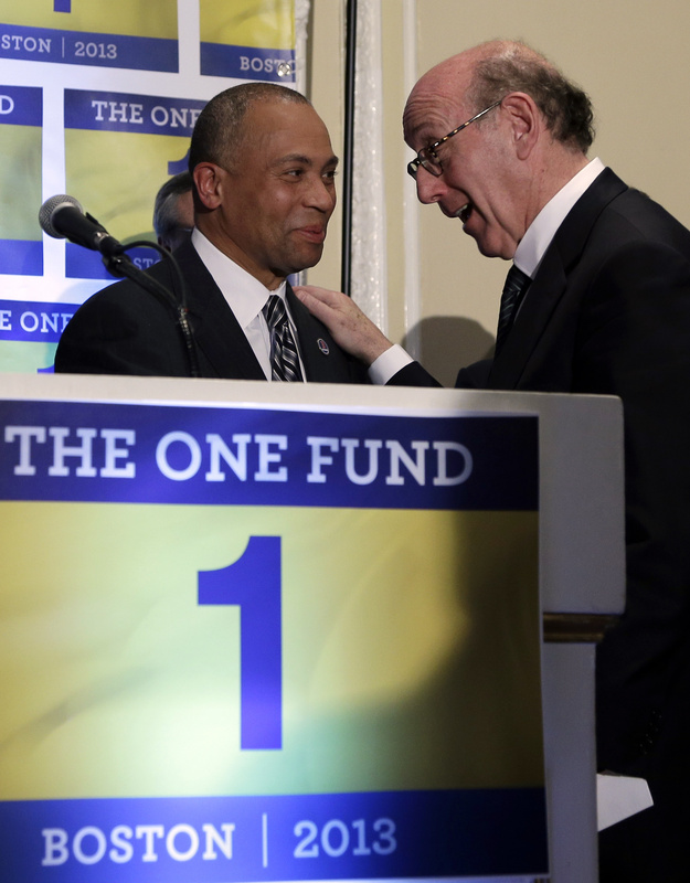 Kenneth Feinberg, right, speaks with Massachusetts Gov. Deval Patrick in Boston last month. Feinberg is the administrator of a fund to help people affected by the Boston Marathon bombings.