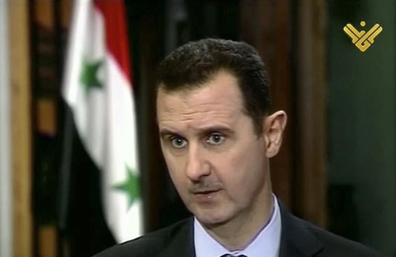 This image made from video shows Syrian President Bashar Assad during an interview broadcast on Al-Manar Television on Thursday.