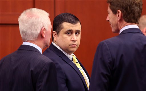 George Zimmerman, defendant in the killing of Trayvon Martin, arrives with his attorney Mark O'Mara, right, for a pretrial hearing on Tuesday in Seminole circuit court, in Sanford, Fla.