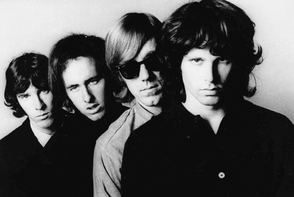 In this undated publicity file photo, members of the Doors, from left, John Densmore, Robbie Krieger, Ray Manzarek and Jim Morrison, pose for a portrait. Manzarek, the keyboardist who was a founding member of The Doors, has died at 74. Publicist Heidi Robinson-Fitzgerald says in a news release that Manzarek died Monday, May 20, 2013, at the RoMed Clinic in Rosenheim, Germany, surrounded by his family. (AP Photo, File)