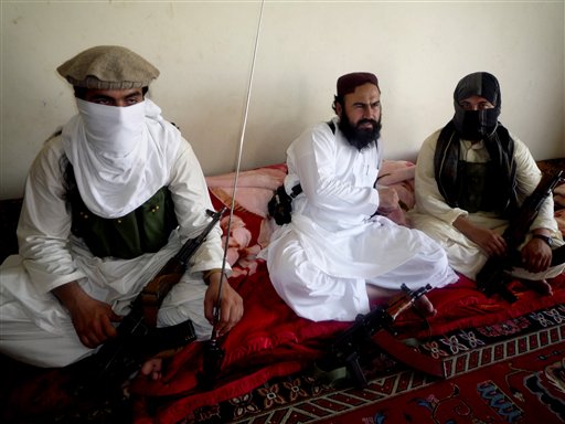 In this July 28, 2011, photo, the Taliban's No 2 commander, Waliur Rehman, talks to the Associated Press during an interview in Shawal area of South Waziristan along the Afghanistan border in Pakistan. Pakistani intelligence officials say a U.S. drone strike has killed Rehman. The Taliban denies he is dead.