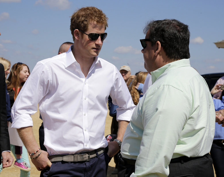 New Jersey Gov. Chris Christie, right, talks to Britain's Prince Harry while visiting the area hit by superstorm Sandy on Tuesday in Seaside Heights, N.J.