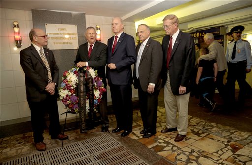 From left, U.S. Congressmen, Steve Cohen, D-Tenn., Dana Rohrabacher, R-Calif., Bill Keating, D-Mass., Steve King, R-Iowa, and Paul Cook, R-Calif., lay a wreath at the site of a terrorist attack in 2000 in the underground street passage in Pushkin Square in downtown Moscow on Wednesday.