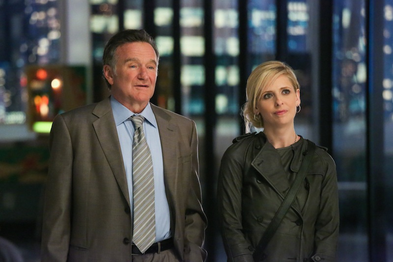 This publicity image released by CBS shows Robin Williams, left, and Sarah Michelle Gellar in a scene from the pilot episode of "The Crazy Ones," a new CBS comedy premiering in the fall of 2013. (AP Photo/CBS, Richard Cartwright) EPISODIC