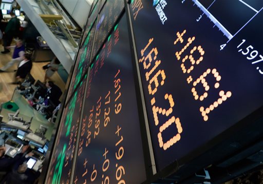 A board overlooking the floor of the New York Stock Exchange shows an intraday number above 1,600 for the S&P 500 on Friday.