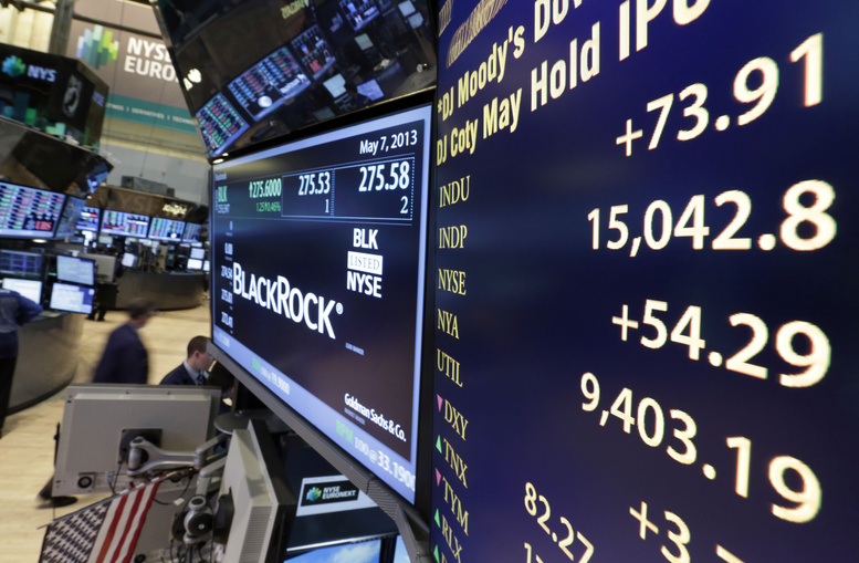 A board on a trading post on the floor of the New York Stock Exchange shows the Dow Jones industrial average with an intraday number above 15,000 on Tuesday.