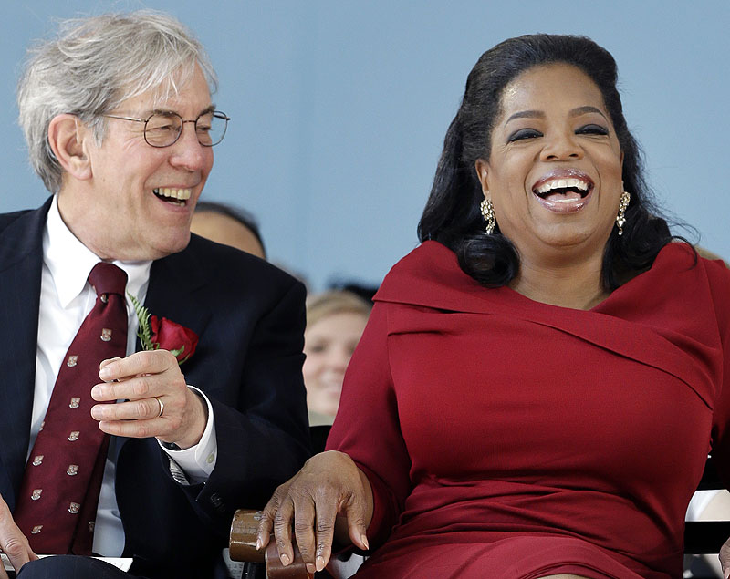Oprah Winfrey laughs before delivering her address at Harvard University in Cambridge, Mass., Thursday.