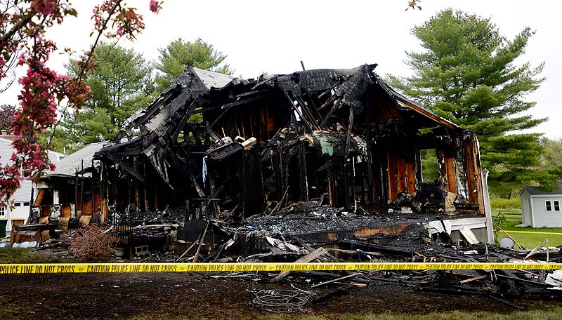 The home at 16 Hillview Ave. that burned following a standoff Saturday night in Saco. Charles Scontras, who was recently separated from his wife, set the fire and and died inside from a self-inflicted gunshot.