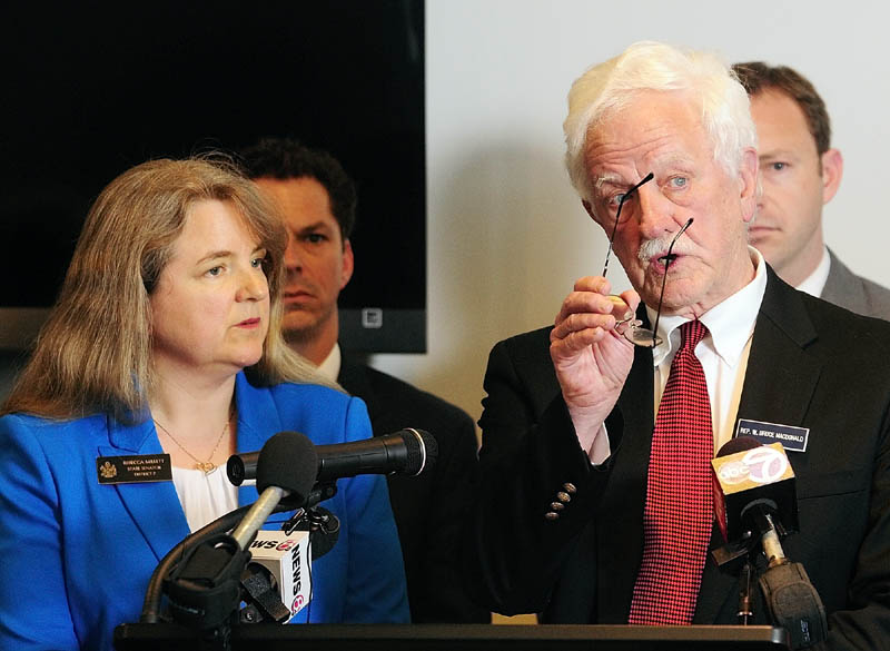 The co-chairs of the Legislature's Education Committee – Sen. Rebecca Millett, D-Cape Elizabeth, and Rep. Bruce MacDonald, D-Boothbay, introduce a Democratic plan to evaluate schools during a news conference on Wednesday at the State House.