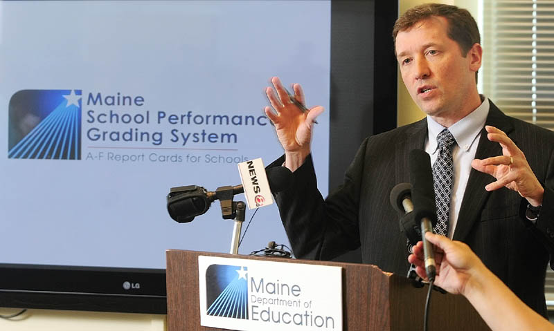 Education Commissioner Stephen Bowen announces a plan to help schools that were given failing grades by the LePage administration, at a news conference Wednesday in the Cross Building in Augusta.