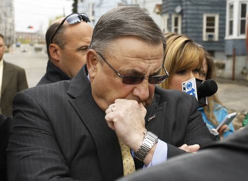 Gov. Paul LePage takes a moment to reflect while addressing the media Tuesday in Lewiston.