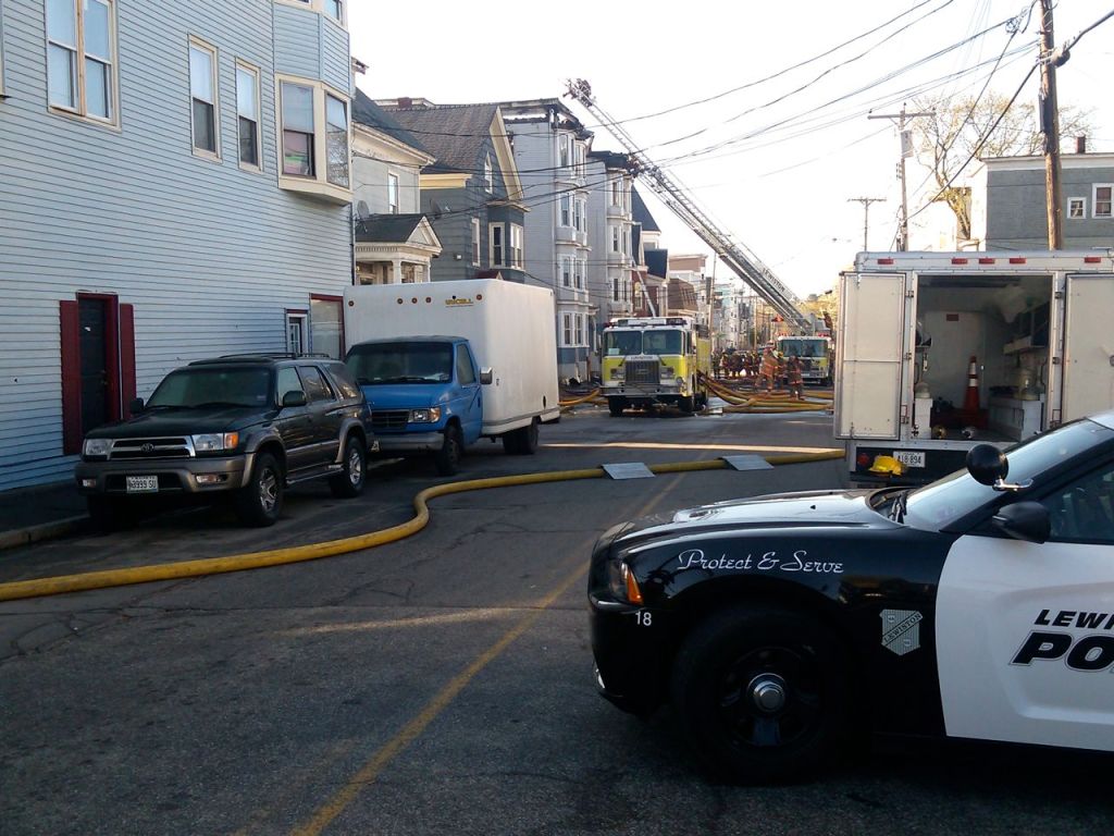 Police and firefighters are on the scene of a three-alarm fire in downtown Lewiston on Monday morning.