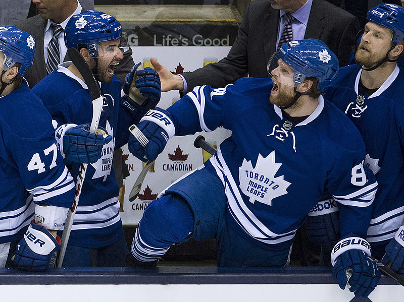 A victorious bench erupts, with Nazem Kadri, left, and former Bruin Phil Kessel screaming in delight after the Maple Leafs held on for a 2-1 victory, forcing Game 7 for Monday. Canada;Canadian;sports;play;ice hockey;game;action;competitive;c
