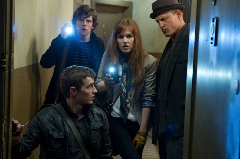 Clockwise from front, Dave Franco, Jesse Eisenberg, Isla Fisher and Woody Harrelson in “Now You See Me,” like “Ocean’s Eleven,” only with magicians.