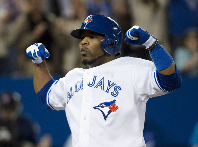 Edwin Encarnacion of the Toronto Blue Jays reacts Tuesday night after hitting his second homer of the game, helping to defeat the Boston Red Sox, 9-7.