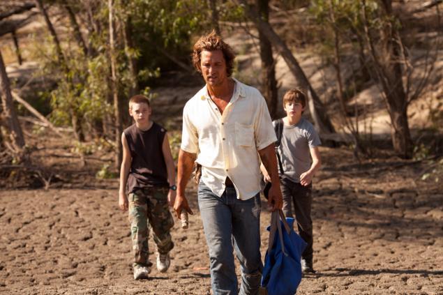 Jacob Lofland, left, Matthew McConaughey and Tye Sheridan in “Mud,” in which the boys help McConaughey’s character, a fugitive, evade bounty hunters.